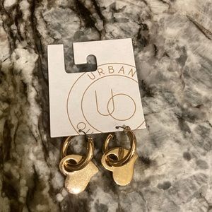 Gold hoop earrings with hoop charm